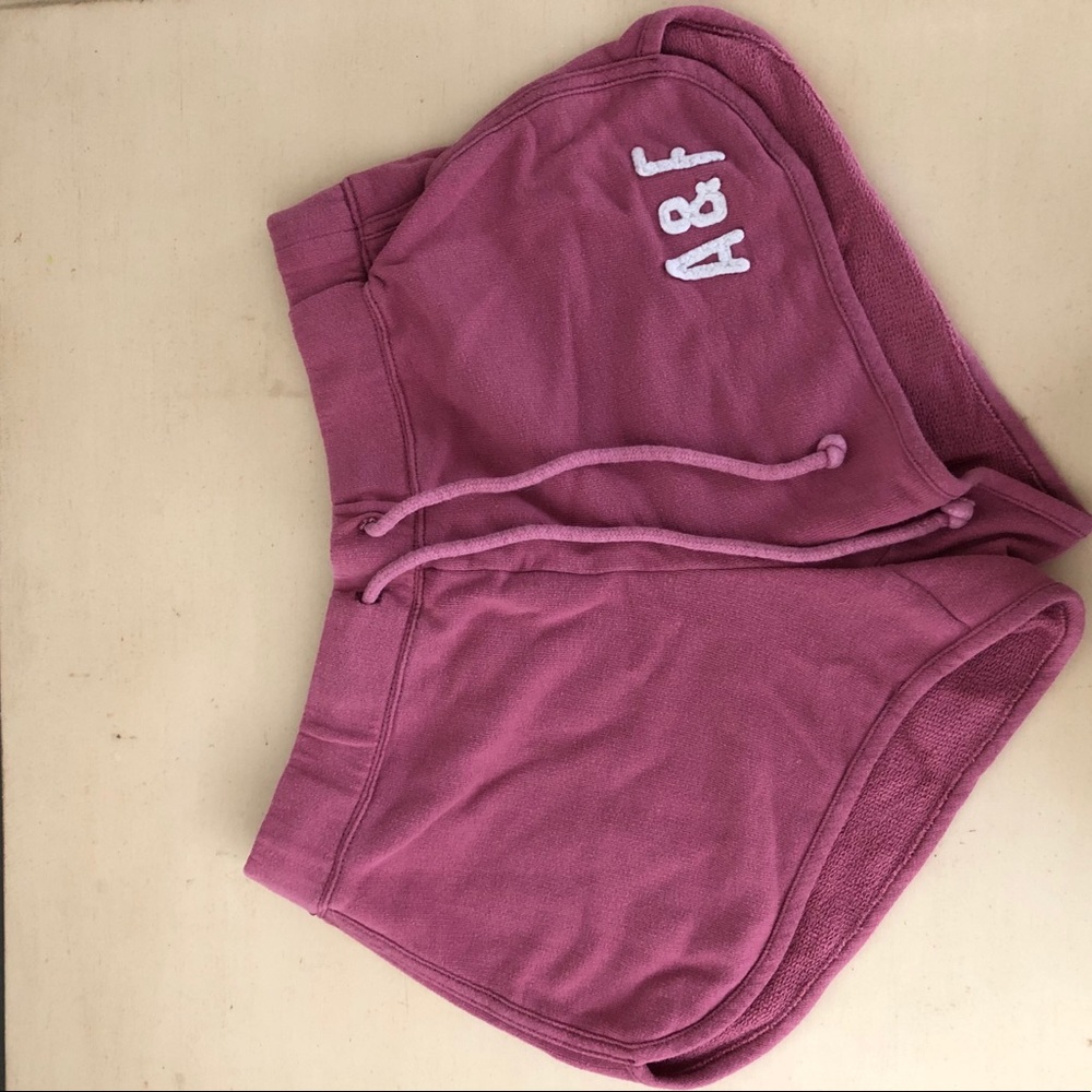 THREE PAIRS OF A & E SHORTS